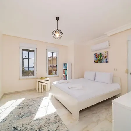 Вилла Astonishing With 3 Shared Pools In Alanya *